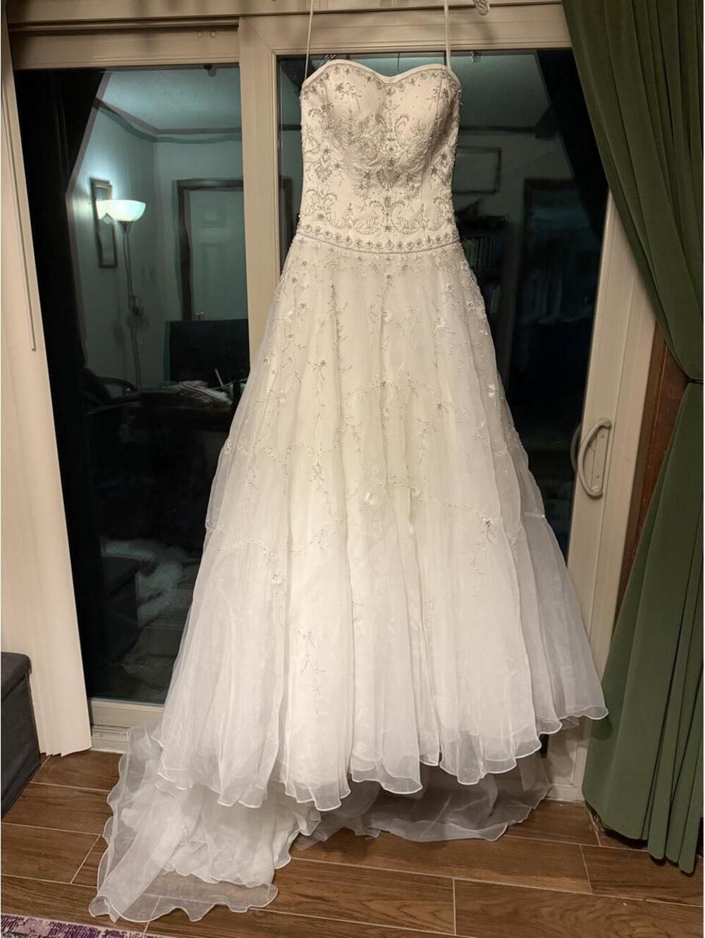 Beautiful Oleg Cassini strapless beaded wedding dress